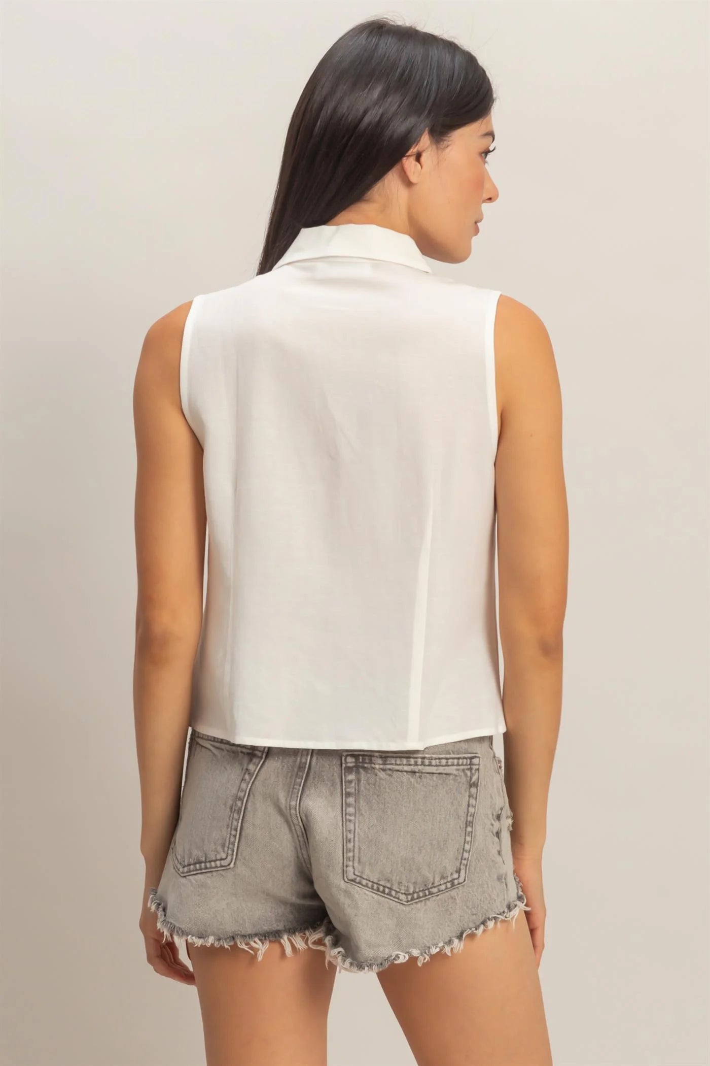 SLEEVELESS BUTTON DOWN BLOUSE