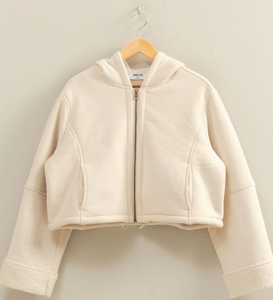 FAUX JACKET HAS ZIP UP FRONT AND HOODIE