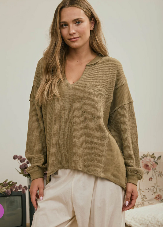SPLIT NECK RAW EDGE LONG SLEEVE RIBBED KNIT TOP